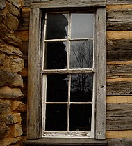 John Oliver Cabin window/chimney detail