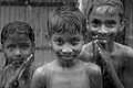 Bangladeshi children enjoying the rain, by bri vos