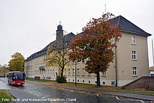 A photograph of the HQ building in Barker Barracks Paderborn c2016. To the right of the building is the memorial wall of 35 Engineer Regiment.[5]