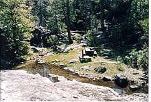 mountain and water at campsite.