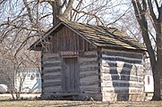 Log smokehouse and gift shop, Novinger log homestead.