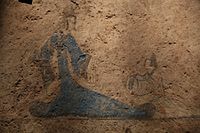 Queen Mother of the West (Hsiwangmu) dressing in the Han dynasty style Hanfu, on a wall mural from the late Western Han dynasty (202 BC - 9 AD) or even Xin Dynasty era (9-25 AD) tomb in Houtun Village (Houtun cun, 后屯村), Dongping County (Dongping xian, 东平县), Shandong Province.