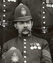 A black and white photo of Green in uniform