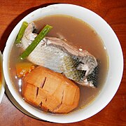 Filipino milkfish sinigang with santol