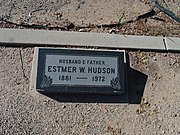 The Grave site of Estmer W. Hudson (1881-1972). Hudson was instrumental in developing a local cotton industry. In 1920, the California Department of Agriculture dubbed him the "father of cotton" in Arizona. It was Hudson who experimented with a more durable variety of Egyptian cotton, which was introduced in the region as a more disease-resistant strain than grown in the Southeastern states. By 1916, Hudson had successfully developed a new cotton — Pima, an improved strain of Yuma, produced from a hybrid Egyptian cotton. His house is listed in the National Register of Historic Places. Hudson is buried in sec. 7-7.