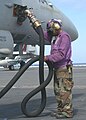 Fuel personnel wear purple and are affectionately known as "grapes".