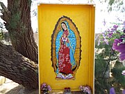 Grave with the image of Our Lady of Guadalupe.