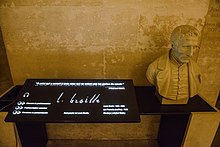 A stone bust of Braille with an audiotronic memorial plaque