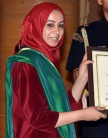 Mehvish Mushtaq being awarded for her work.