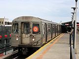 Manhattan-bound D train at the station