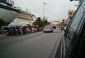 A police car of the Bermuda Police Service drives westward on Front Street on the 6 June, 2006, responding to an incident