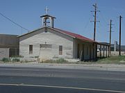 Our Lady of Guadalupe. The first Catholic Church building in Queen Creek is located on the north side of Ocotillo, 3/8 mile west of Ellsworth Road. Listed as historical by the San Tan Historical Society.