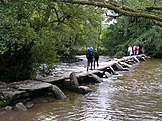 Tarr Steps a prehistoric clapper bridge across the River Barle in the Exmoor National Park.