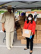 Terri Sewell distributing food relief in Alabama