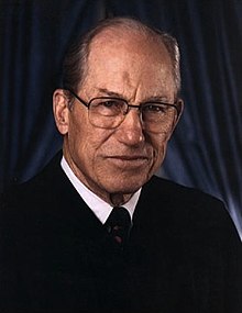 Byron White, in his Supreme Court attire, poses for a headshot.