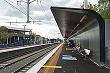 The new side platforms at the modern southland station, with a shelter in the foreground