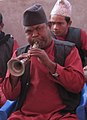 The Nepalese version, called the sahane, has a curve and is played in the panche baja.