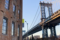 Entrance to Smack Mellon on 92 Plymouth Street with the Manhattan Bridge in the background