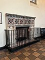 The hall: medieval fireplace against west wall.