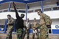 ABIJAN, Cote d'Ivoire An Ivorian Sailor gives directions to Turkish Navy SAT assigned to the Maritime Security Centre of Excellence Mobile Training Team at the initial training meeting at the Ivorian Naval Base March 20, 2017.