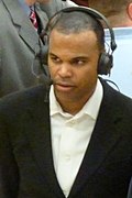 Amaker just after clinching Harvard's first Ivy League title with the 2010–11 Harvard Crimson