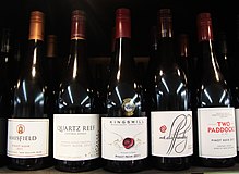 Photograph of Pinot Noir bottgles from various vineyards