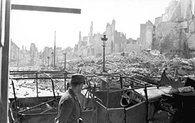 May 1940: Soldier of 10th Panzer Division in the ruins of Calais.