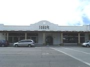 The O.S. Stapley Hardware Store Building was built in 1947. The O.S. Stapley Hardware Company was a prominent company in the Salt River Valley, with branches in Mesa, Glendale, and Phoenix. In Chandler, many families purchased their farm equipment. The building is located at 63 East Boston Street. The building is listed as historical by the Chandler Historical Society.