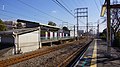 The view looking east from platform 1, with platform 2 on the left