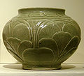 A cut and engraved sandstone and celadon jar from Yaozhou in Shaanxi, 10th-11th century.