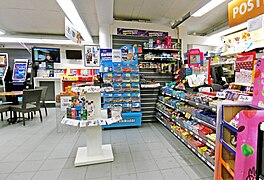 Interior of a R-kioski in Jyväskylä. The Veikkaus lottery game counter and slot machines are on the far-left of this picture