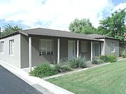 The Governor John Howard Pyle House was built in 1938 and is located at 1120 S. Ash Avenue. Pyle was the 9th Governor of Arizona (Arizona Governor, 1950-1954). The property is listed in the Tempe Historic Property Register.