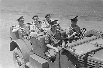 Five Royal Dutch Marechaussee riding in a WC-56/-57 Command Car – 1946, Bogor, West Java, during the Indonesian war of independence.