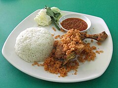Ayam goreng served with rice and sambal