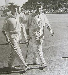 Don Bradman and Sid Barnes walk from the field in 1946