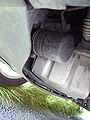 Oil filter mounted beneath engine (Saab 9-5)