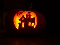 Pumpkin craft for Halloween, using a commercial carving pattern
