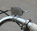 Traditional 3-speed thumb-lever shifter, this is a Sturmey Archer shifter made between 1967 and 1975, it is missing its clear plastic applique which displays the gear selected and the manufacturer's branding.