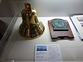 JDS Hamana’s bell and commemorative plaque on display.