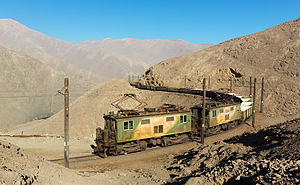 SQM "Boxcabs" 603 and 607 hauling empty nitrate hoppers from Tocopilla to Barriles, Chile