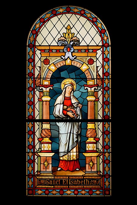 图为描绘匈牙利的圣依撒伯尔的18世纪玻璃花窗，摄于斯洛文尼亚卢布尔雅那的城市博物馆。今天是她的瞻礼日。