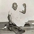 Prakasarayadu spinning cotton on his charkha