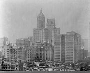 The newly completed Singer Building towering above the city, 1909