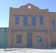 The McCormick Building was built in 1928 and is located at 149 West Boston Street. It originally housed the I.O.O.F. (Independent Order of Odd Fellows) Hall and Armory. The building is listed as historical by the Chandler Historical Society.