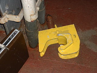 Coupling adapter for use between Janney coupler on a locomotives and WABCO-2 couplers fitted to commuter rail multiple units at New York's Pennsylvania Station. The adapter is seen from the bottom