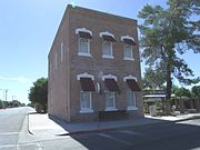 The Conrad Brunenkant City Bakery Building was built in 1890 and is located in 291 Bailey St. The two story red brick building was built for Conrad Brunenkant, a Dutch-born baker and grocer. Listed as Historic by the Historic District Advisory Commission.