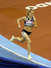 An example of Keely Hodgkinson's track & field uniform which exposes her midriff and belly button while running at the Birmingham Indoor Grand Prix in 2022