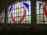 The Stained glass windows as seen from the interior of the station.