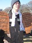 Protester holding copy of the Ten Commandments at 2009 March For Life in Washington, DC