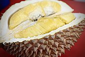 An opened Musang King durian